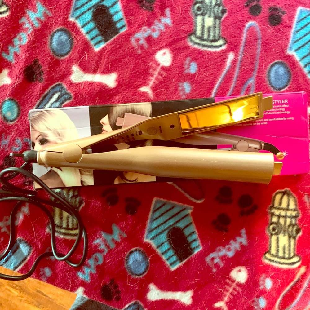 Straightener/curling steam iron